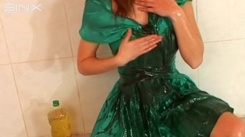 Sexy Babe In Satin Drenches Herself In Oil Screencap 18 on www.sinx.com