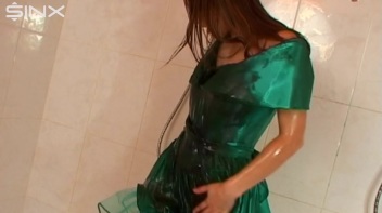 Sexy Babe In Satin Drenches Herself In Oil Screencap 36 on www.sinx.com