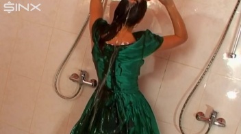 Sexy Babe In Satin Drenches Herself In Oil Screencap 61 on www.sinx.com