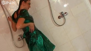 Sexy Babe In Satin Drenches Herself In Oil Screencap 64 on www.sinx.com