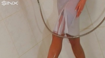 Brunette In White Dress Seductively Showers Screencap 12 on www.sinx.com