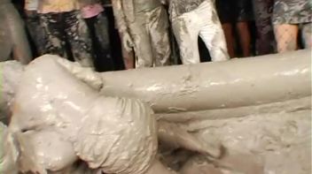 Two Dozen Babes Cheer On The Mud Fight Screencap 11 on www.sinx.com