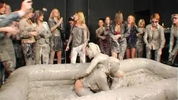 Two Dozen Babes Cheer On The Mud Fight Screencap 12 on www.sinx.com