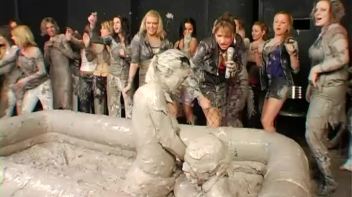 Two Dozen Babes Cheer On The Mud Fight Screencap 14 on www.sinx.com