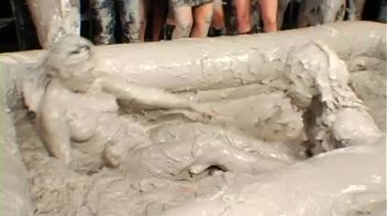 Two Dozen Babes Cheer On The Mud Fight Screencap 23 on www.sinx.com