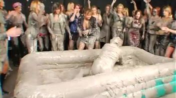 Two Dozen Babes Cheer On The Mud Fight Screencap 32 on www.sinx.com
