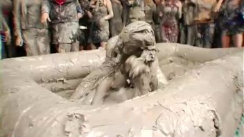 Two Dozen Babes Cheer On The Mud Fight Screencap 34 on www.sinx.com