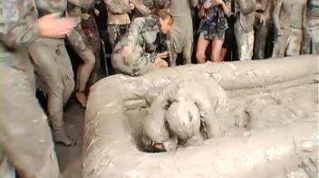 Two Dozen Babes Cheer On The Mud Fight Screencap 39 on www.sinx.com
