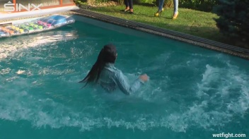 Three wild girls in pool cat fight Screencap 14 on www.sinx.com