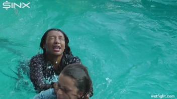 Three wild girls in pool cat fight Screencap 15 on www.sinx.com