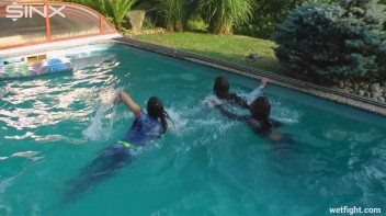 Three wild girls in pool cat fight Screencap 24 on www.sinx.com
