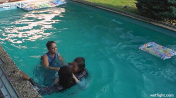 Three wild girls in pool cat fight Screencap 29 on www.sinx.com