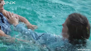 Three wild girls in pool cat fight Screencap 30 on www.sinx.com