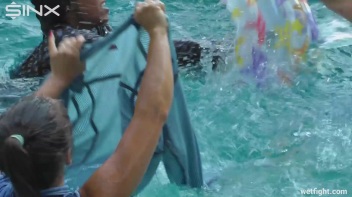 Three wild girls in pool cat fight Screencap 31 on www.sinx.com