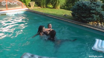 Three wild girls in pool cat fight Screencap 40 on www.sinx.com