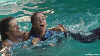 Three wild girls in pool cat fight Screencap 42 on www.sinx.com