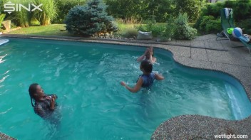 Three wild girls in pool cat fight Screencap 62 on www.sinx.com