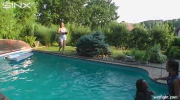 Three wild girls in pool cat fight Screencap 66 on www.sinx.com