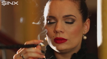 Seductive Babe With Red Lips Enjoys Smoking Screencap 3 on www.sinx.com