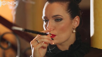 Seductive Babe With Red Lips Enjoys Smoking Screencap 6 on www.sinx.com