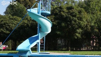 Waterpark Fun For Fully Clothed Brunette Babe Screencap 13 on www.sinx.com