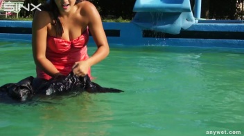 Waterpark Fun For Fully Clothed Brunette Babe Screencap 18 on www.sinx.com