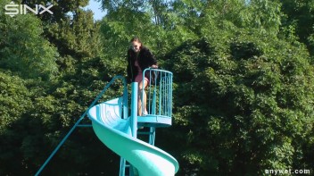 Waterpark Fun For Fully Clothed Brunette Babe Screencap 3 on www.sinx.com