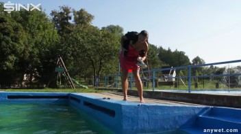 Waterpark Fun For Fully Clothed Brunette Babe Screencap 31 on www.sinx.com