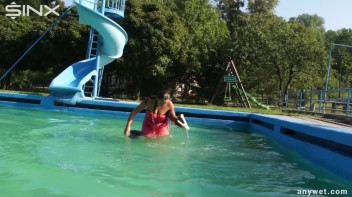 Waterpark Fun For Fully Clothed Brunette Babe Screencap 32 on www.sinx.com