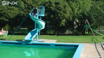 Waterpark Fun For Fully Clothed Brunette Babe Screencap 4 on www.sinx.com