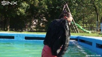 Waterpark Fun For Fully Clothed Brunette Babe Screencap 40 on www.sinx.com