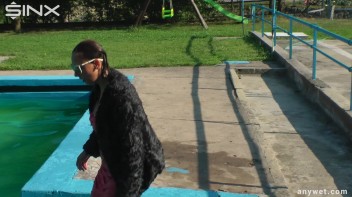 Waterpark Fun For Fully Clothed Brunette Babe Screencap 46 on www.sinx.com