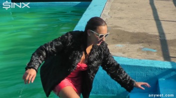Waterpark Fun For Fully Clothed Brunette Babe Screencap 52 on www.sinx.com