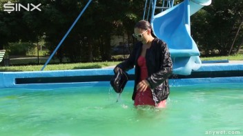 Waterpark Fun For Fully Clothed Brunette Babe Screencap 6 on www.sinx.com