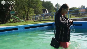 Waterpark Fun For Fully Clothed Brunette Babe Screencap 7 on www.sinx.com