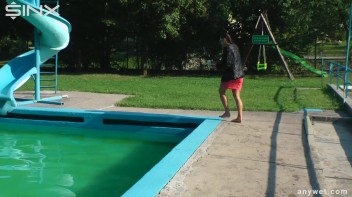 Waterpark Fun For Fully Clothed Brunette Babe Screencap 12 on www.sinx.com