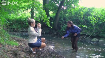 Clothed Babes Get Drenched And Catfight In Stream Screencap 11 on www.sinx.com