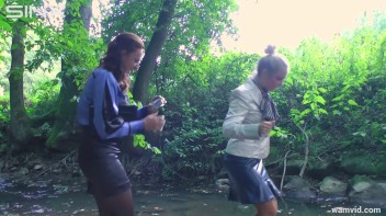 Clothed Babes Get Drenched And Catfight In Stream Screencap 13 on www.sinx.com