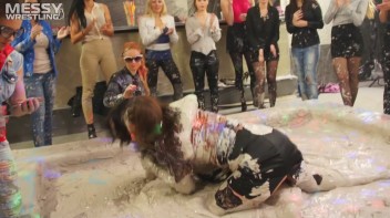 Messy Wrestling: Brunette VS. Black-Haired - Blouse Beauties Bust A Move In The Mud! Topless Toppies ... Screencap 15 on www.sinx.com