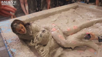 Messy Wrestling: Brunette VS. Black-Haired - Blouse Beauties Bust A Move In The Mud! Topless Toppies ... Screencap 25 on www.sinx.com