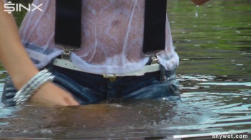 Seductive Blonde Smokes And Gets Drenched In Lake Screencap 31 on www.sinx.com