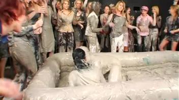 Two Dozen Babes Cheer On The Mud Fight Screencap 4 on www.sinx.com