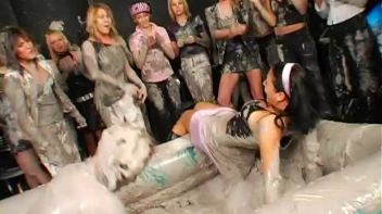 Two Dozen Babes Cheer On The Mud Fight Screencap 5 on www.sinx.com