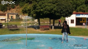 Raven Haired Hottie Soaks Herself At Waterpark Screencap 2 on www.sinx.com