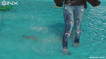 Raven Haired Hottie Soaks Herself At Waterpark Screencap 4 on www.sinx.com