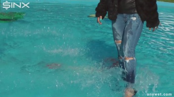 Raven Haired Hottie Soaks Herself At Waterpark Screencap 5 on www.sinx.com