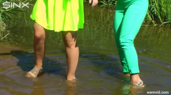 Three luscious ladies get soaked exercising in a river Screencap 27 on www.sinx.com