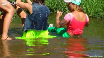 Three luscious ladies get soaked exercising in a river Screencap 39 on www.sinx.com
