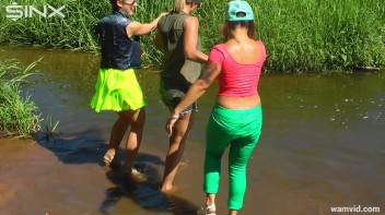 Three luscious ladies get soaked exercising in a river Screencap 44 on www.sinx.com