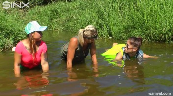 Three luscious ladies get soaked exercising in a river Screencap 63 on www.sinx.com